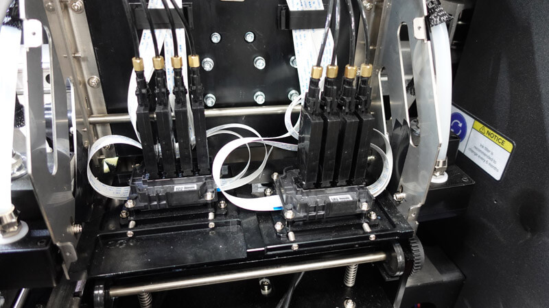 В принтере используются две четырехканальные печатающие головки Epson i1600